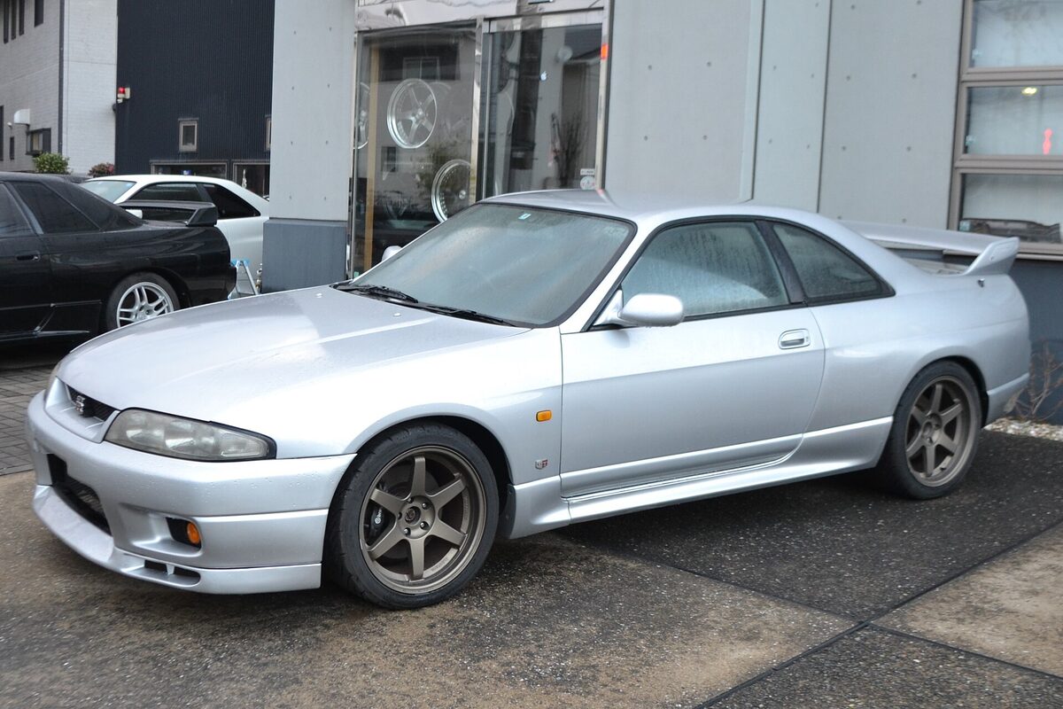 Silver Nissan Skyline R33 GT-R side view